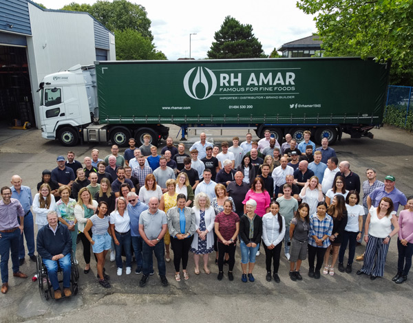 rh amar group photo in front of a branded truck